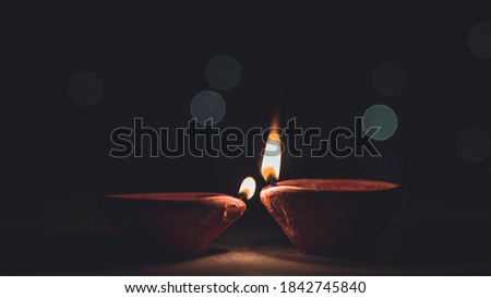 Diwali Diya(oil lamp) also known as diva. Diwali is biggest festival of India. Diwali is festival of lights and happiness. Royalty-Free Stock Photo #1842745840