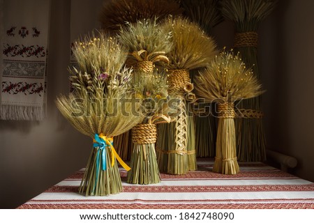 Didukh. Ukrainian Christmas decoration and traditional symbol. Made of straw of different cereals. Didukh literally means the spirit of ancestors. Royalty-Free Stock Photo #1842748090