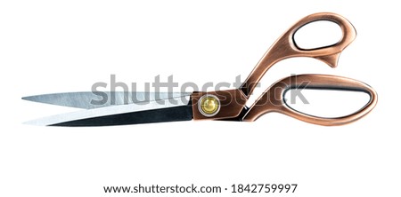Tailor's scissors isolated on a white background