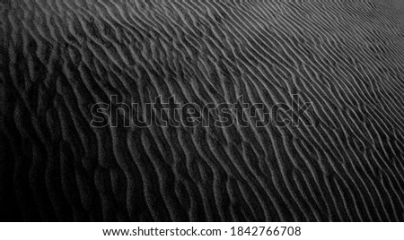 Black and white shaded sands of the desert. Background and texture for modern design