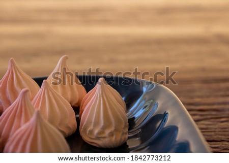 Meringue on a plate - selective focus