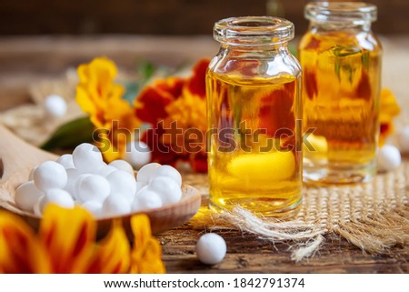 tincture of flowers of Chernobrivtsov in a small jar. selective focus.medical