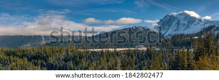 Mt. Baker, Washington, Ski Area. Popular ski resort and lodge with the snow capped peak of Mt. Shucksan looming in the background.