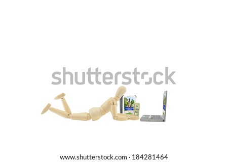 Mannequin laying down holding Money looking at Laptop with Real Estate For Sale Open House Welcome sign on screen isolated on white background