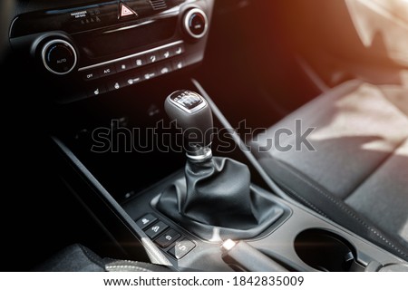 Interior view of a modern new car. Manual transmission gear of new car. Royalty-Free Stock Photo #1842835009