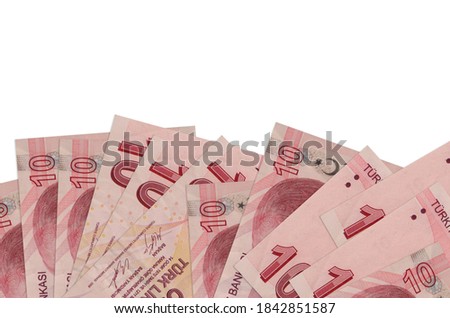 10 Turkish liras bills lies on bottom side of screen isolated on white background with copy space. Background banner template