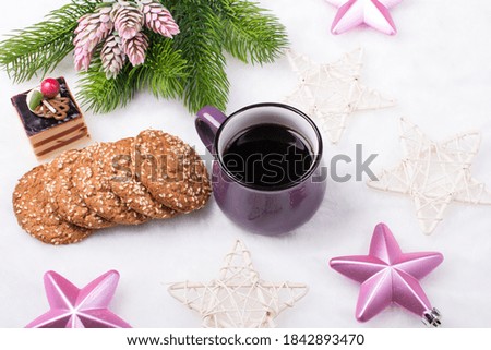Christmas holiday Breakfast. A Cup of coffee and ginger cookies with sweets