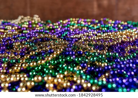 Close-up of Mardi Gras beads in pile
