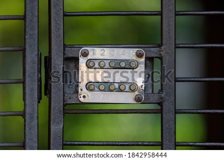 button code lock on the gate