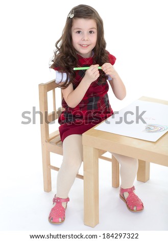 Kids,girl,kid,child- ids drawing with crayons.  Isolated on white background.
