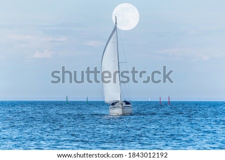 Sailboat on the Baltic Sea with Moon