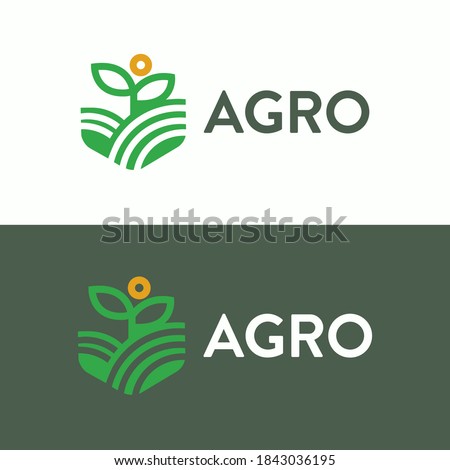 Growing plant in the green field farm under the sun agricutural logo Royalty-Free Stock Photo #1843036195