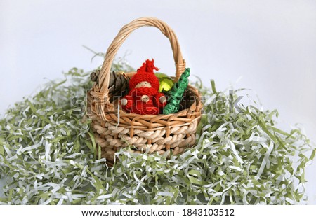 basket with Christmas toys tinsel