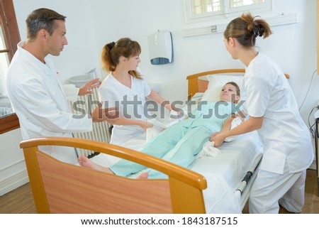 trying to move the patient Royalty-Free Stock Photo #1843187515