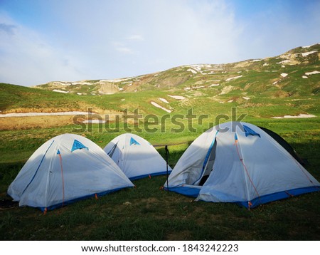 Camping tents and nature in the mountains
