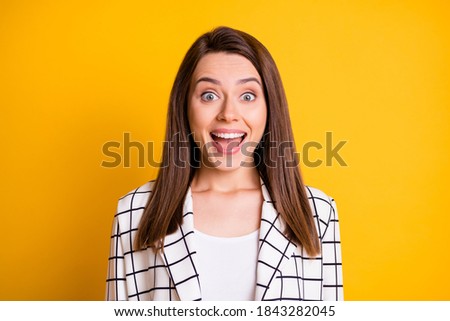 Photo portrait of suprised pretty toothy woman student dressed white tartan blazer open mouth isolated yellow color background