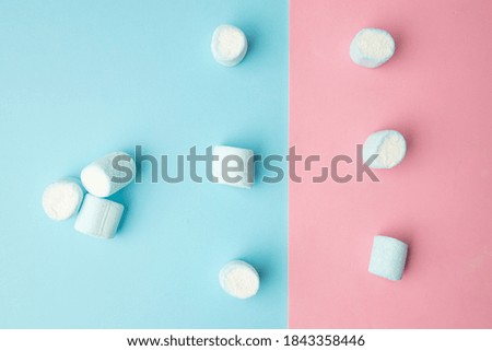 blue marshmallows on pink background