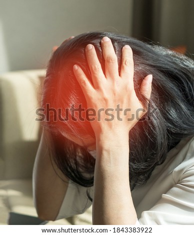 Brain diseases problem cause chronic severe headache migraine. Woman adult look tired and stressed out depressed, having mental problem trouble, medical concept Royalty-Free Stock Photo #1843383922