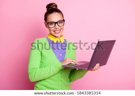 Photo of positive smart high school student girl study remote laptop enjoy coaching teacher online academic courses wear green shirt isolated pastel color background