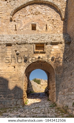 Fascinating ruins of the 
Acrocorinth (Upper Corinth), the acropolis of ancient Corinth, overseeing the ancient city of Corinth Royalty-Free Stock Photo #1843412506