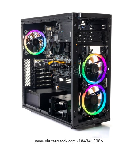 Studio shot of black Gaming desktop pc with rgb lights and visible components. Isolated on white background. Royalty-Free Stock Photo #1843415986