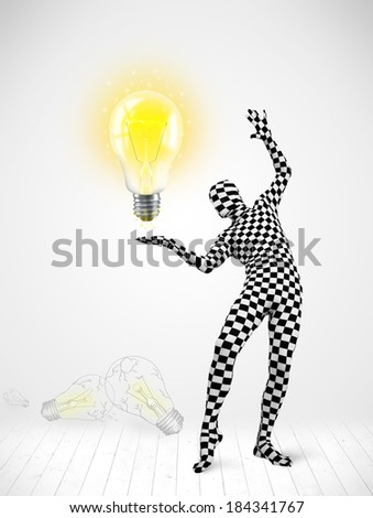 Funny man in full body suit with glowing light bulb, new idea concept