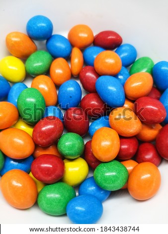 Close-up image of colourful chocolate candy  isolated on white background.