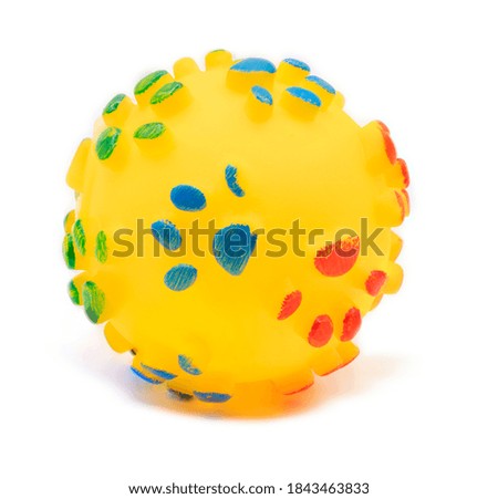 A picture of a ball toy dog ​​on a white background