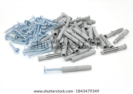 tapping screws with dowels isolated on a white background