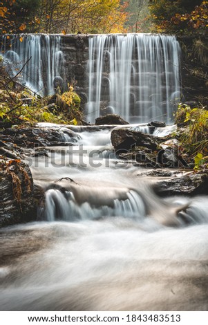 Autumn waterfalls and fast forrest streams. Long exposure.