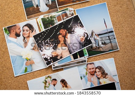 a printed copy of the wedding photos. the result of a photo session of the bride and groom.