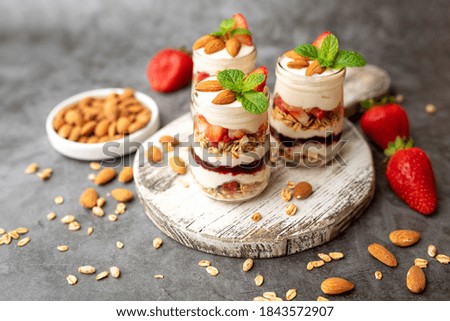 Strawberry Dessert Jar, yogurt fruit parfait topped with almonds