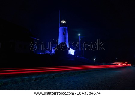 75 years NV blue light on the lighthouse and water tower
