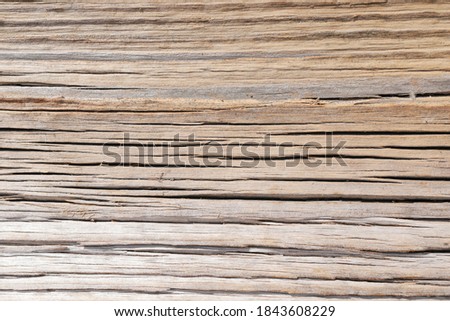 brown and unpainted wooden background, natural planks for a template, no person and space for a text
