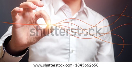 Man aligns branched lines into a single straight. Solving problems and conflicts. Settle things up. Peace of mind, concentration forces to achieve goal. Confidence, success. Simplification planning. Royalty-Free Stock Photo #1843662658