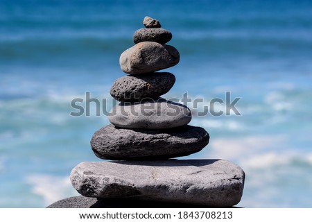 Stack of stones on the sea beach