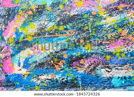 Abstract art on canvas with many oil stains spread apart