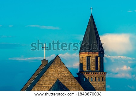 St. Lady of Maria Christian Church Roof with Sunset Clouds - Alytus Church.
