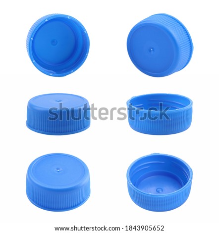 Blue plastic bottle caps isolated on white background. Royalty-Free Stock Photo #1843905652