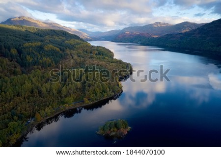 Loch Lomond aerial view at Autumn during sunrise near Tarbet Royalty-Free Stock Photo #1844070100