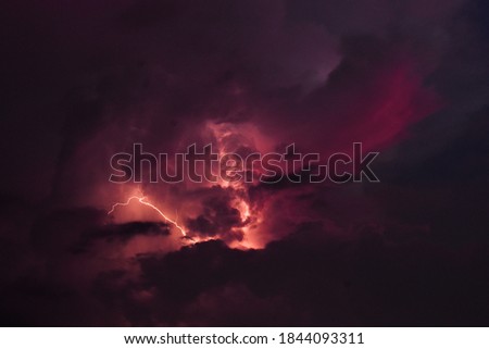A huge explosion inbetween the clouds I mean lightning