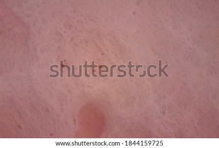 Pink lake background, pink water, salt solution texture.
