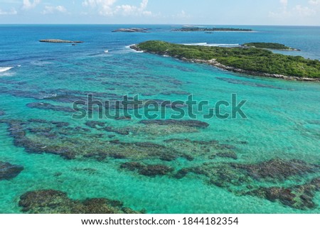 Captivating aerial view of vibrant water and islands.