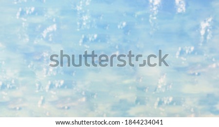 Snowy abstract background. Blue blurred background with sparkles. copyspace.  Winter Christmas background. Christmas background.