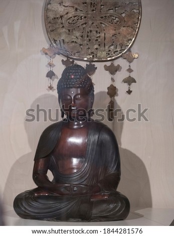 a statue of buddha, founder of the religion of buddhism