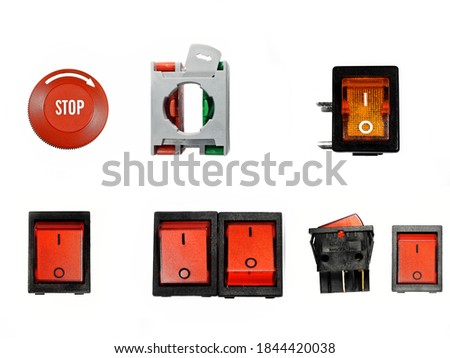 Collection​ of​ Red emergency stop​ switches and buttons, isolated on white background.