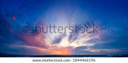 Dawn or sunset over the clouds, blue hour, aerial view. Royalty-Free Stock Photo #1844466196