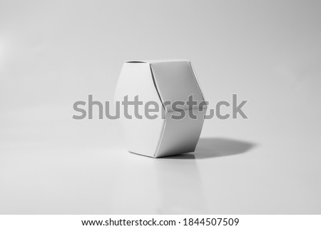 White hexagonal carton box white background