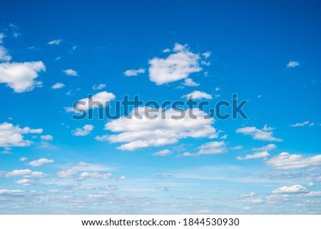 The beauty of nature for graphic design, ecology and clean air. Bright blue sky and many white clouds. For desktop background, wallpaper. Natural textures. Kyiv (Kiev), Ukraine, Europe.