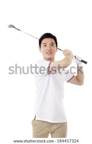 	A businessman playing golf	